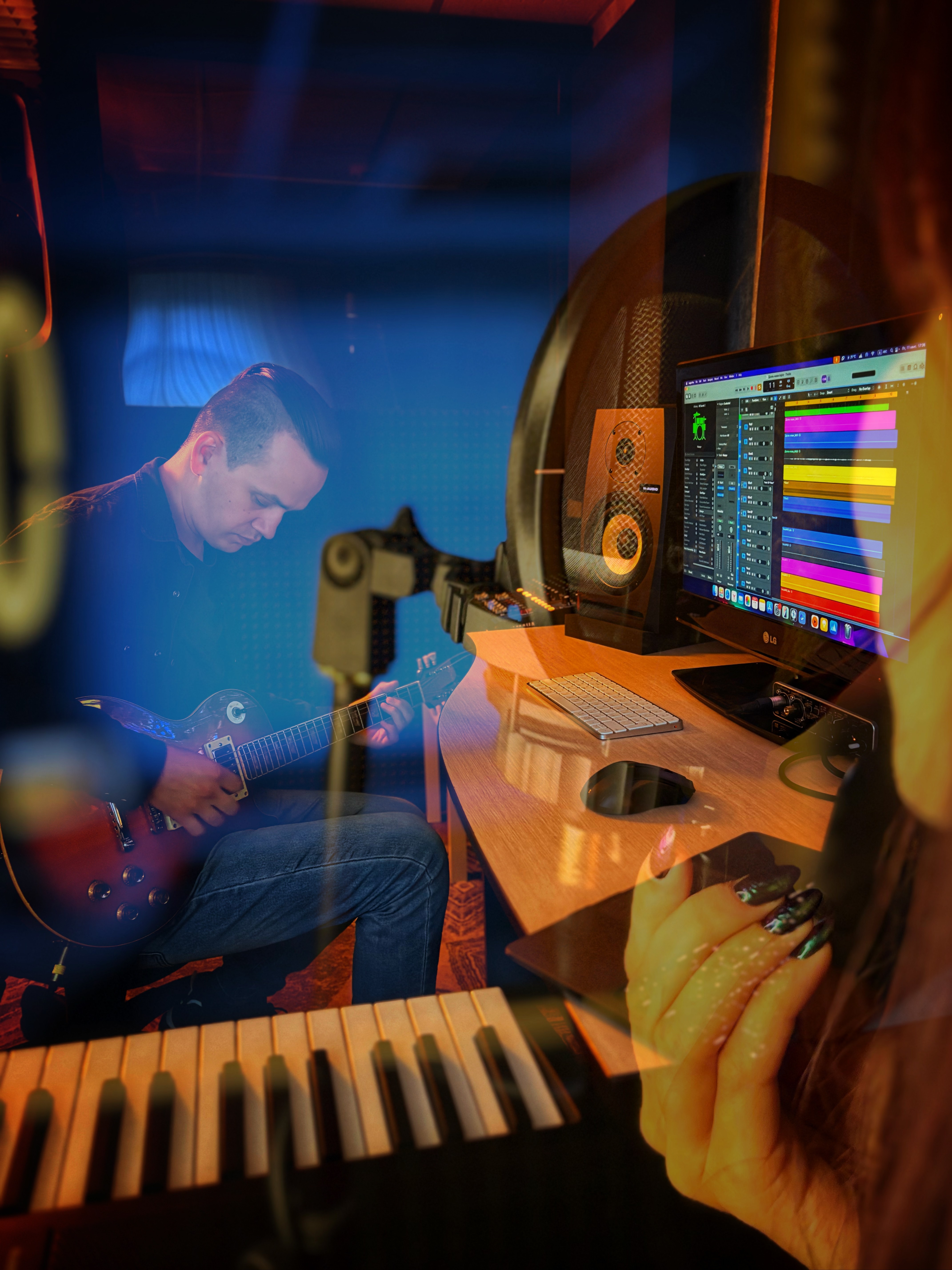 Music Producer sitting at his desk